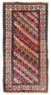 A Kazakh Wool Rug 7 feet 6 inches x 3 feet 8 inches. — CIRCA 1880