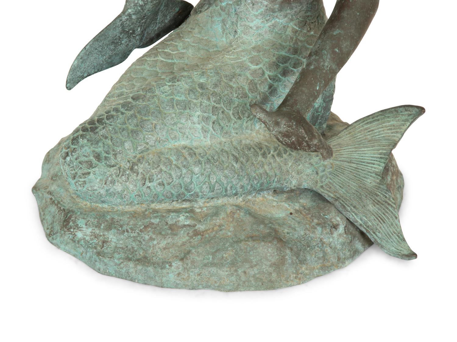 A Chinese Bronze Sculpture of a Mermaid with Dolphin