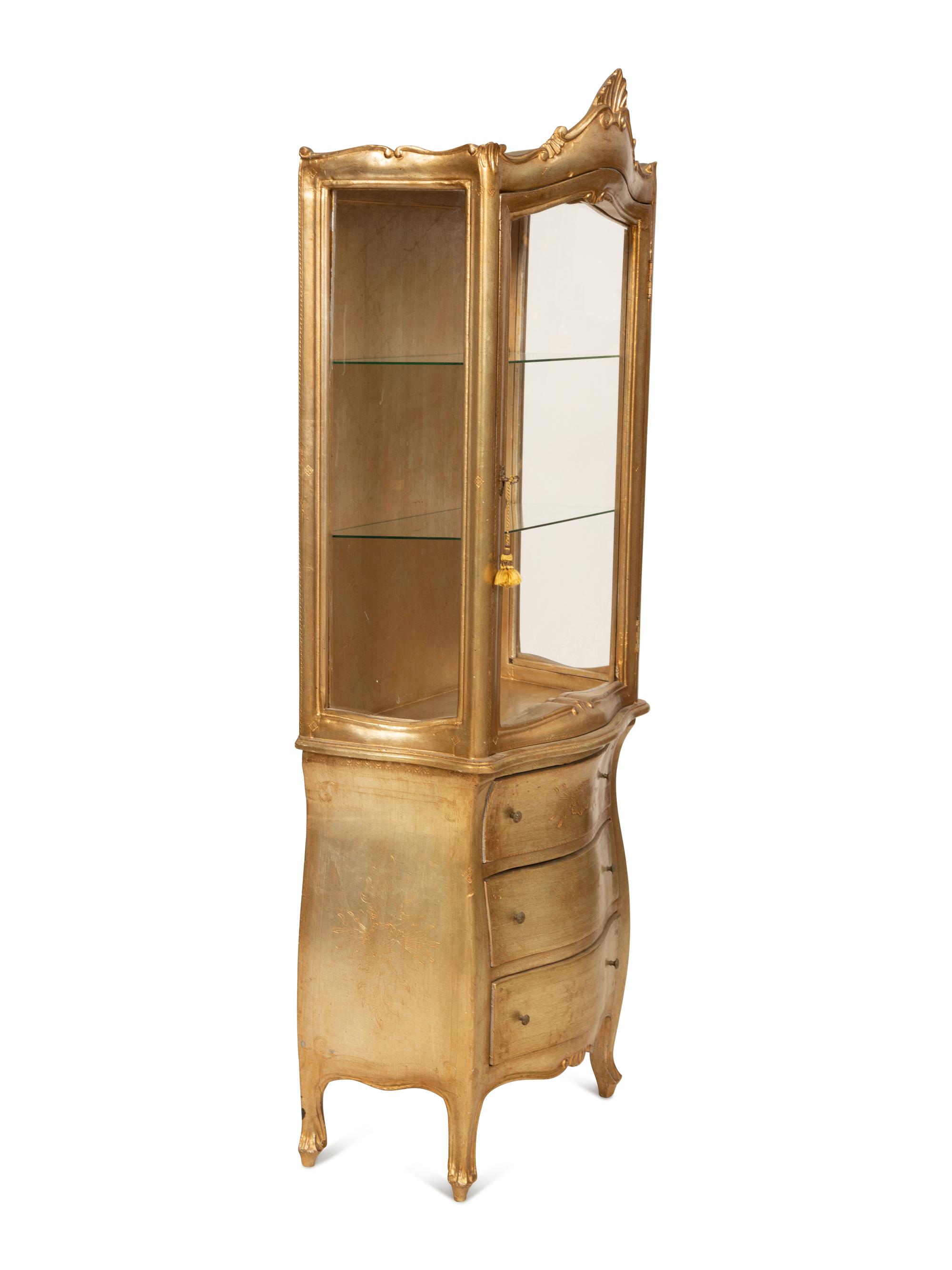 A Silvered Wood Vitrine Cabinet on Three Drawer Bombe Commode Base