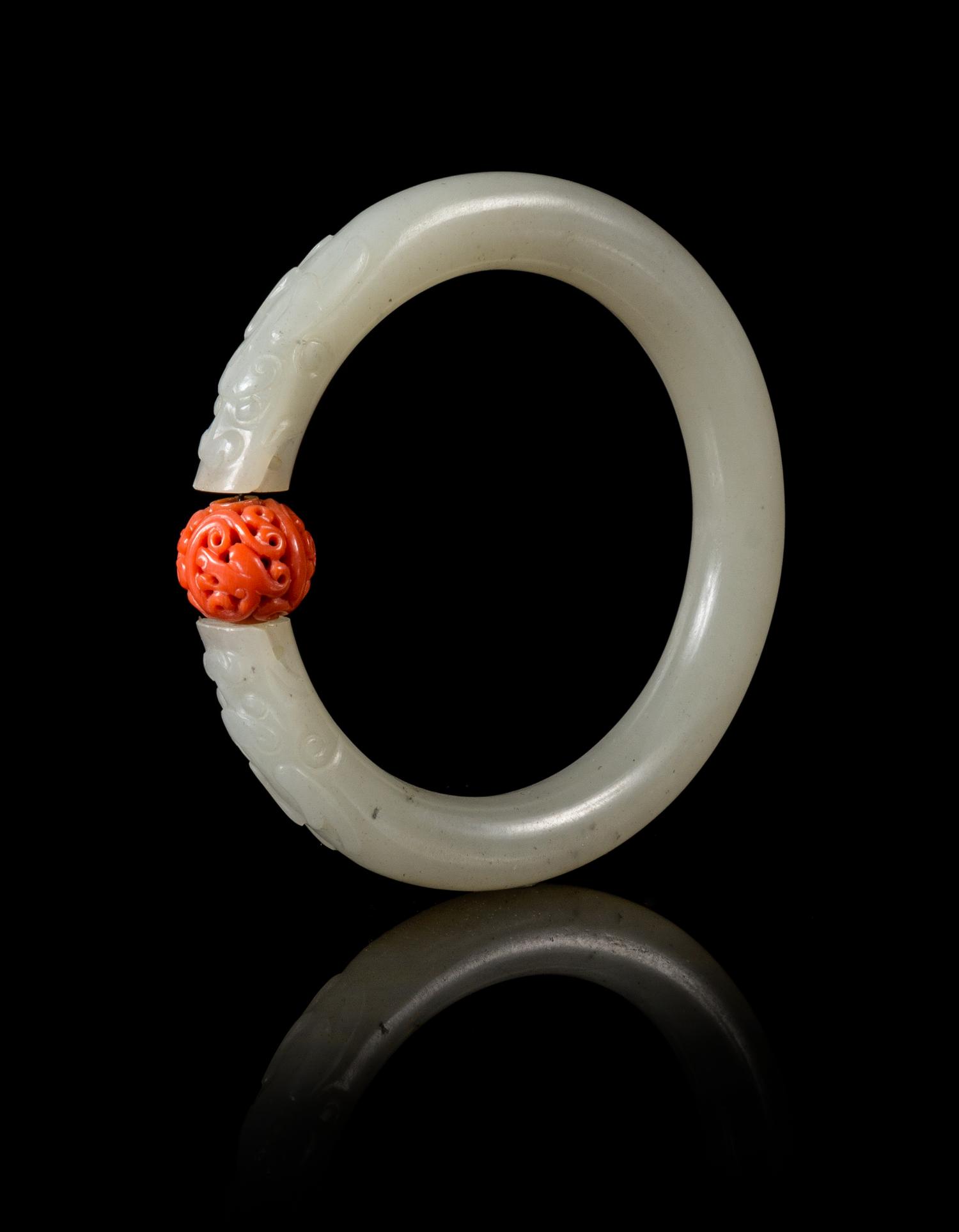 A Carved Celadon Jade Bangle Diameter 3 1/4 inches. — 19TH/20TH CENTURY