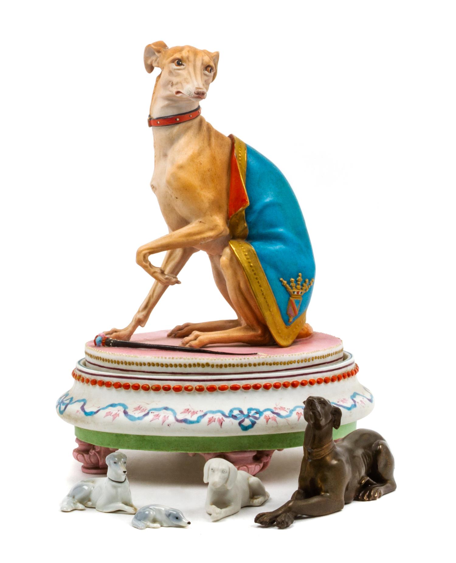 A Group of Five Whippet Figures Height of tallest 10 3/4 inches.