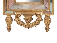 An Italian Baroque Style Giltwood Mirror