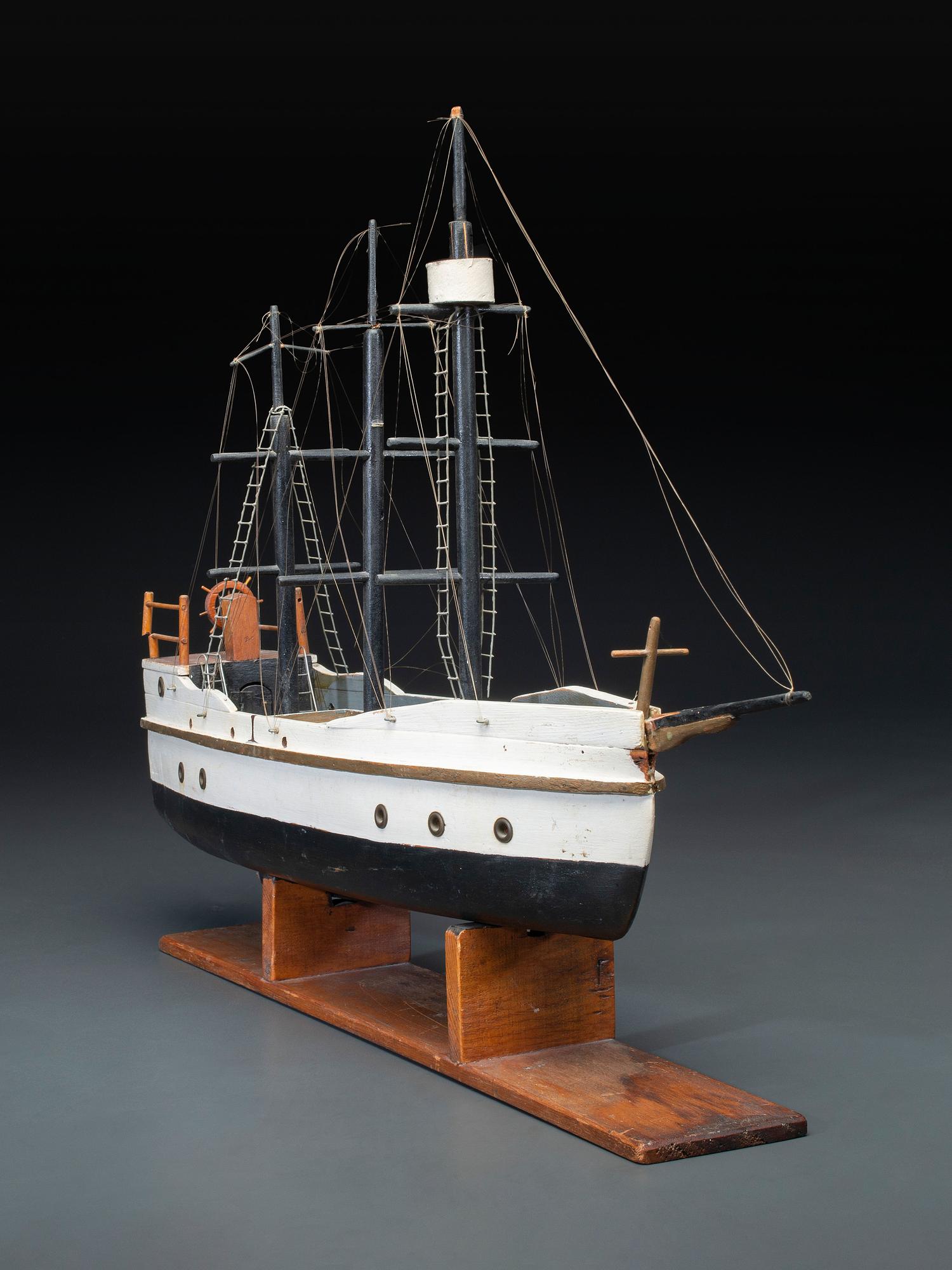 A Carved and Painted Wood Three-Masted Ship Model