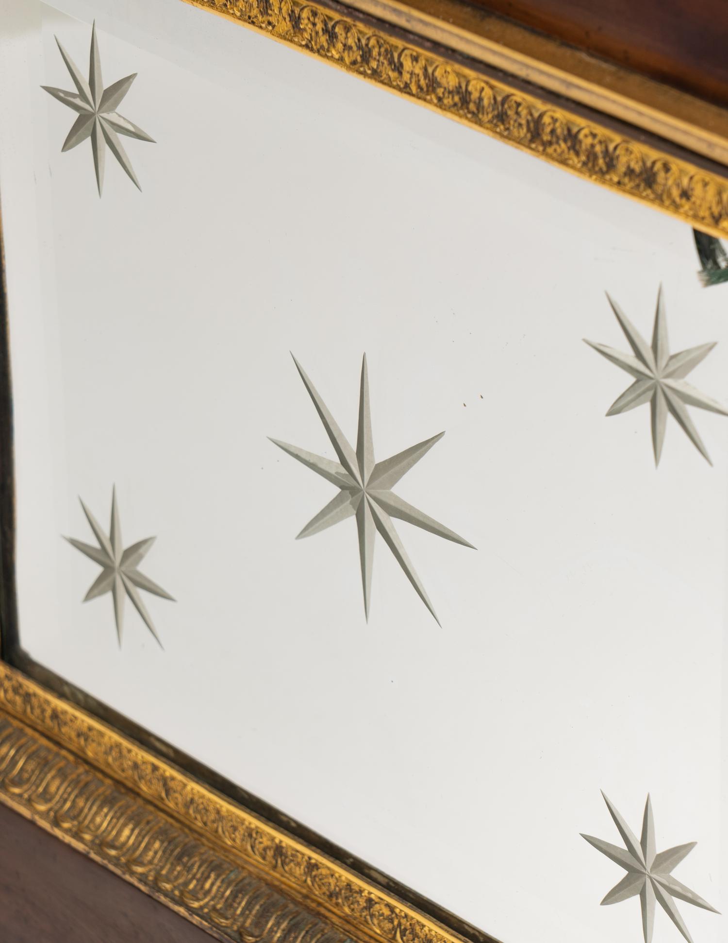 A Charles X Gilt and Patinated Bronze and Mirrored Glass Mantel Clock
