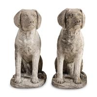 A Pair of Cast Stone Figures of Dogs