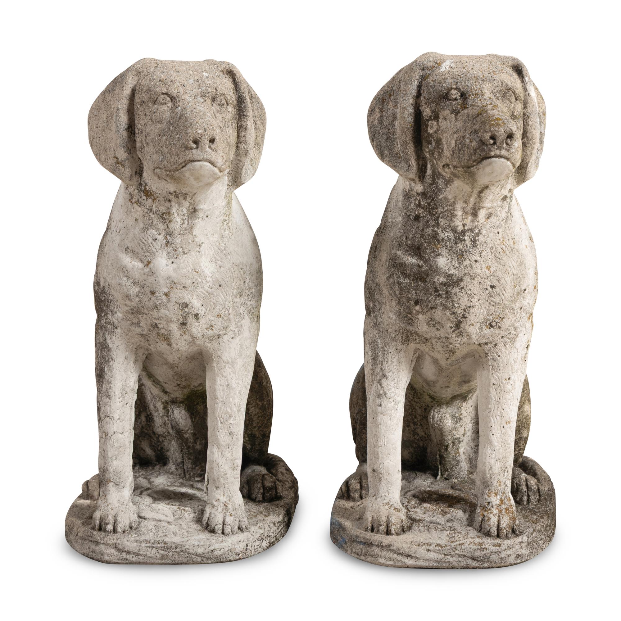 A Pair of Cast Stone Figures of Dogs