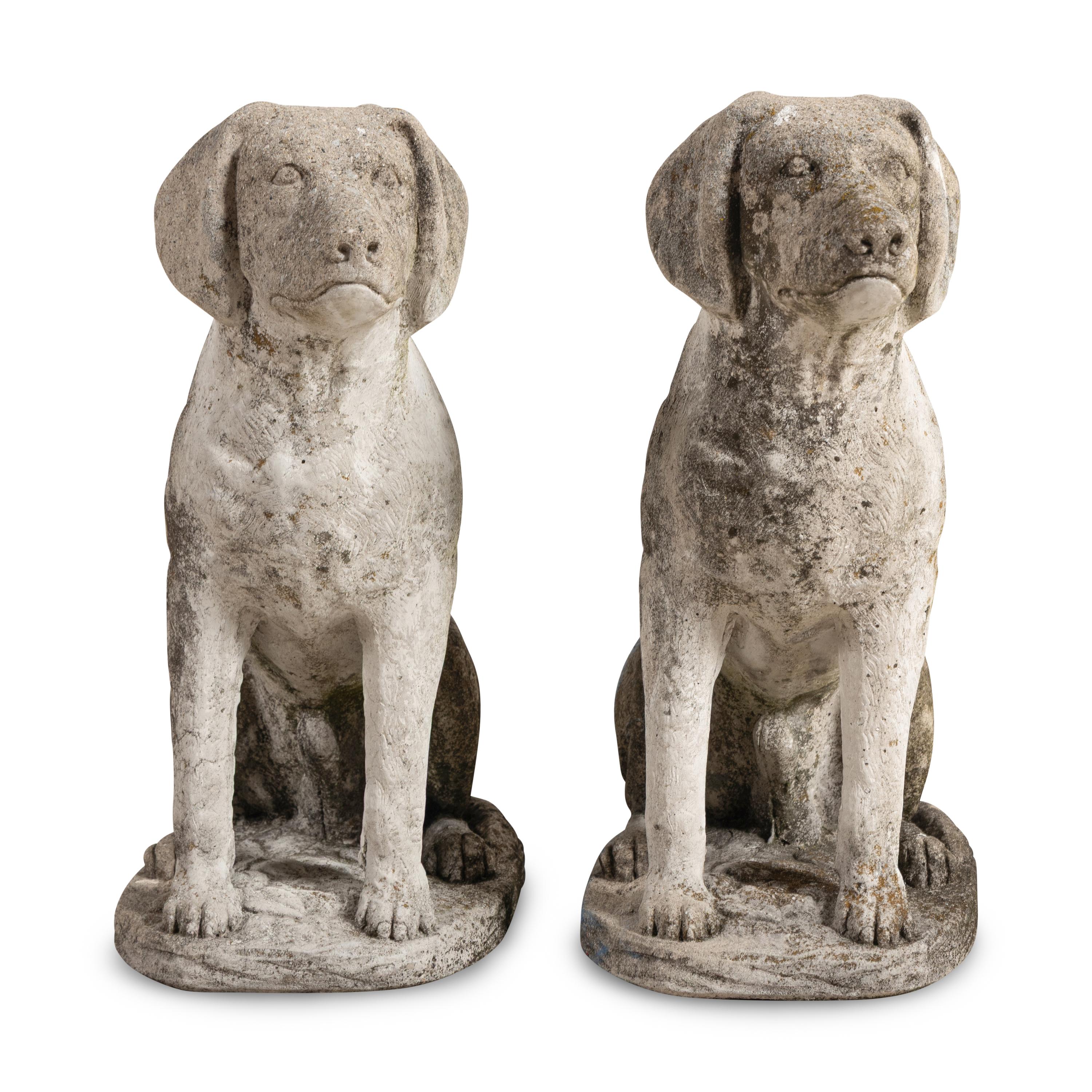 A Pair of Cast Stone Figures of Dogs