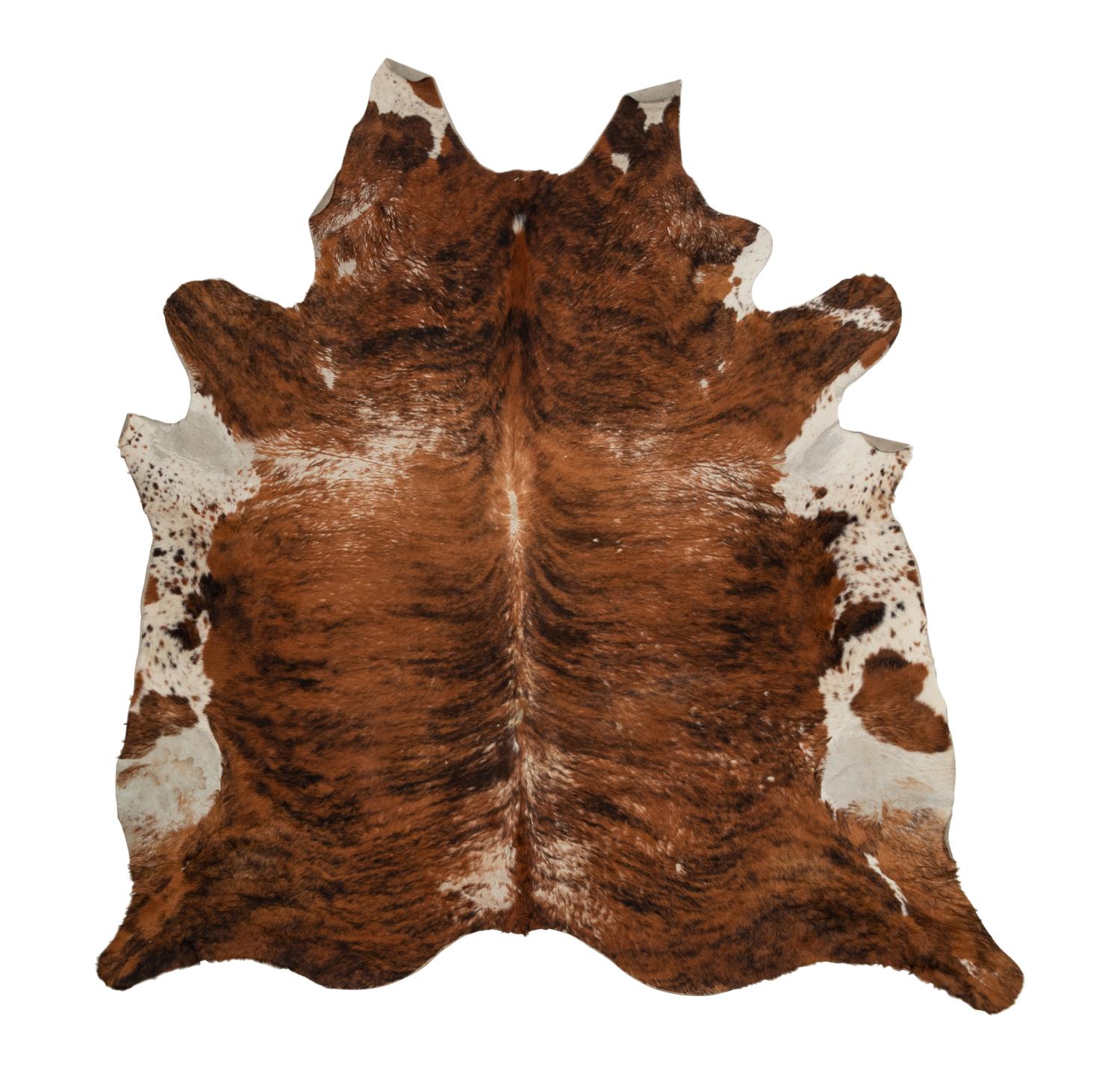 A Pair of Faux Cowhide Rugs