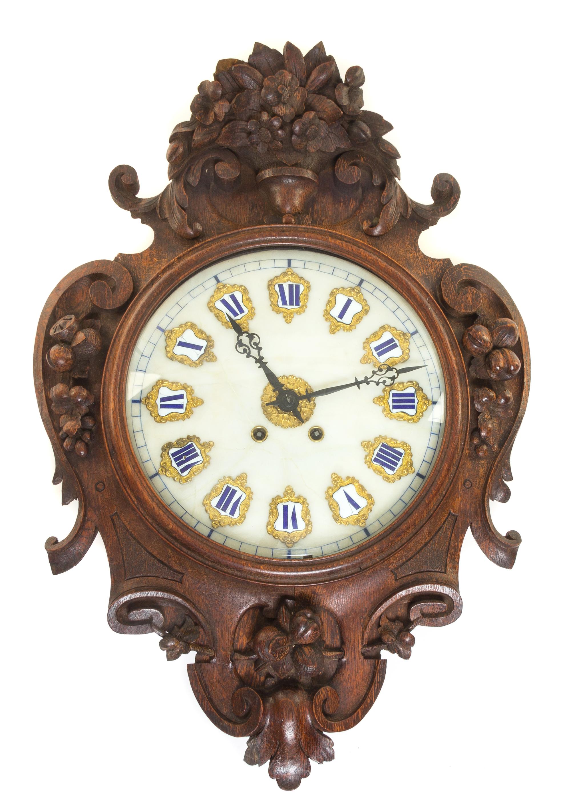 A French Oak Wall Clock Length 28 1/2 inches. — LATE 19TH CENTURY