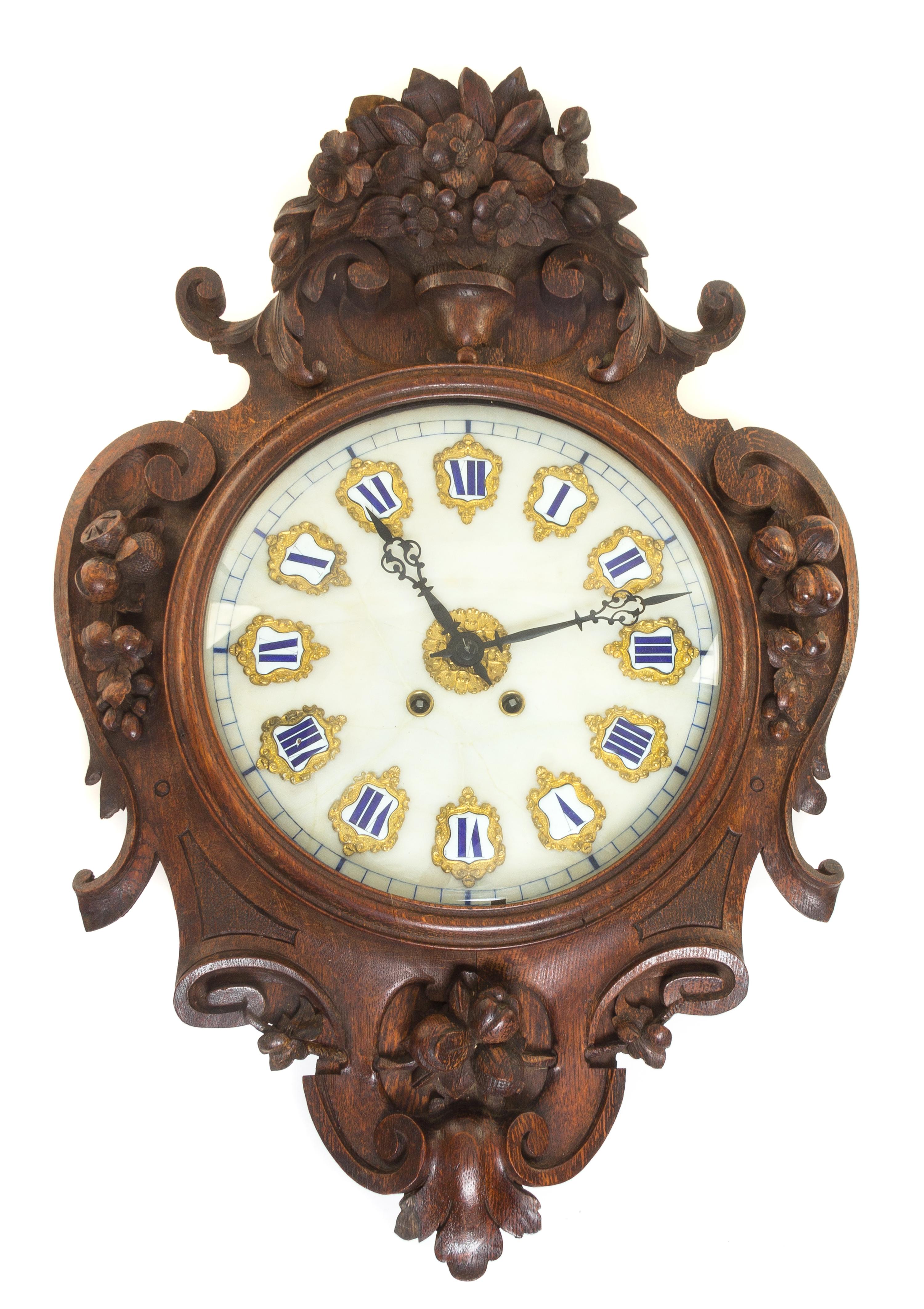 A French Oak Wall Clock Length 28 1/2 inches. — LATE 19TH CENTURY