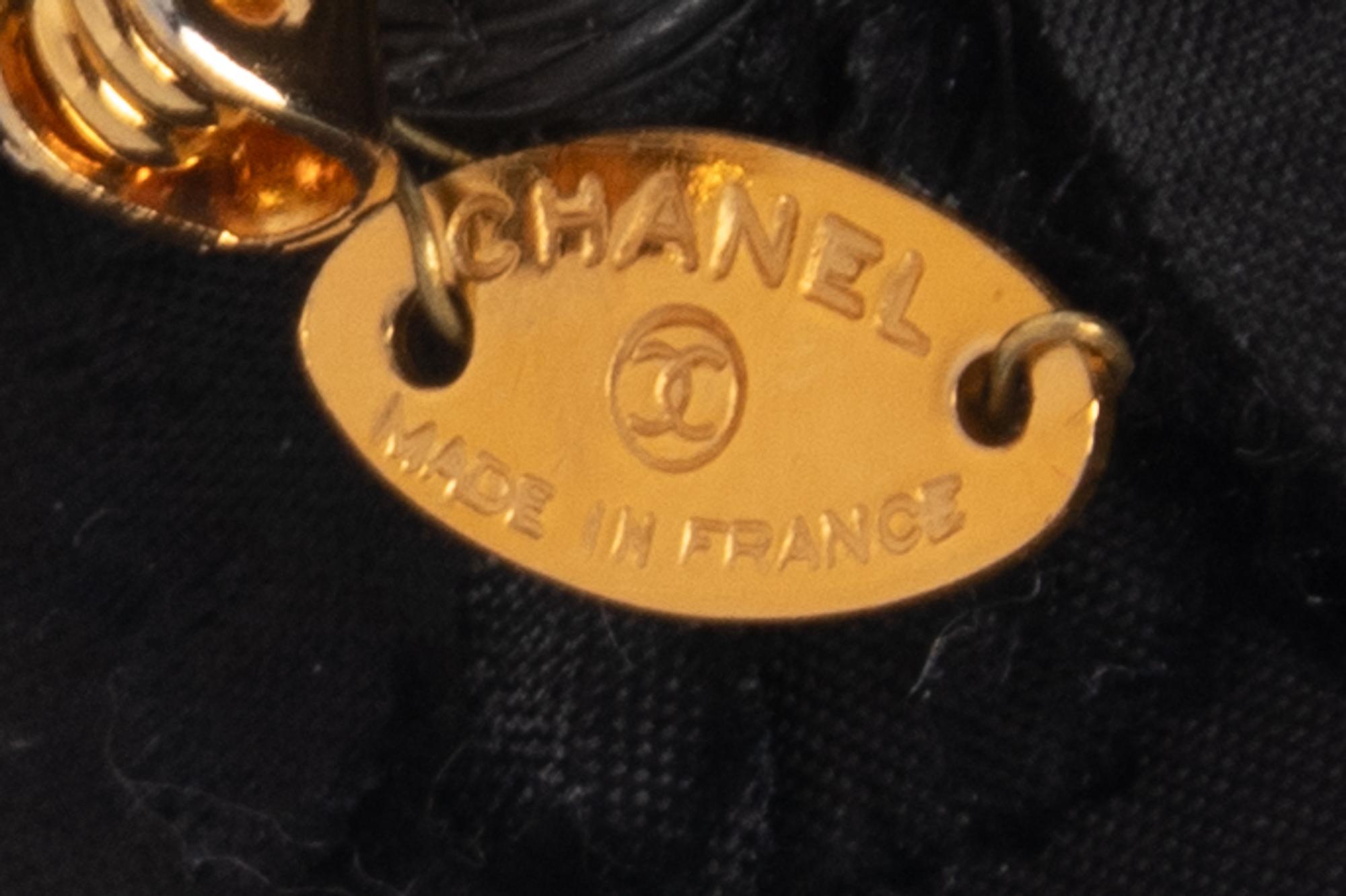 Chanel Magnifying Glass Necklace & Camellia