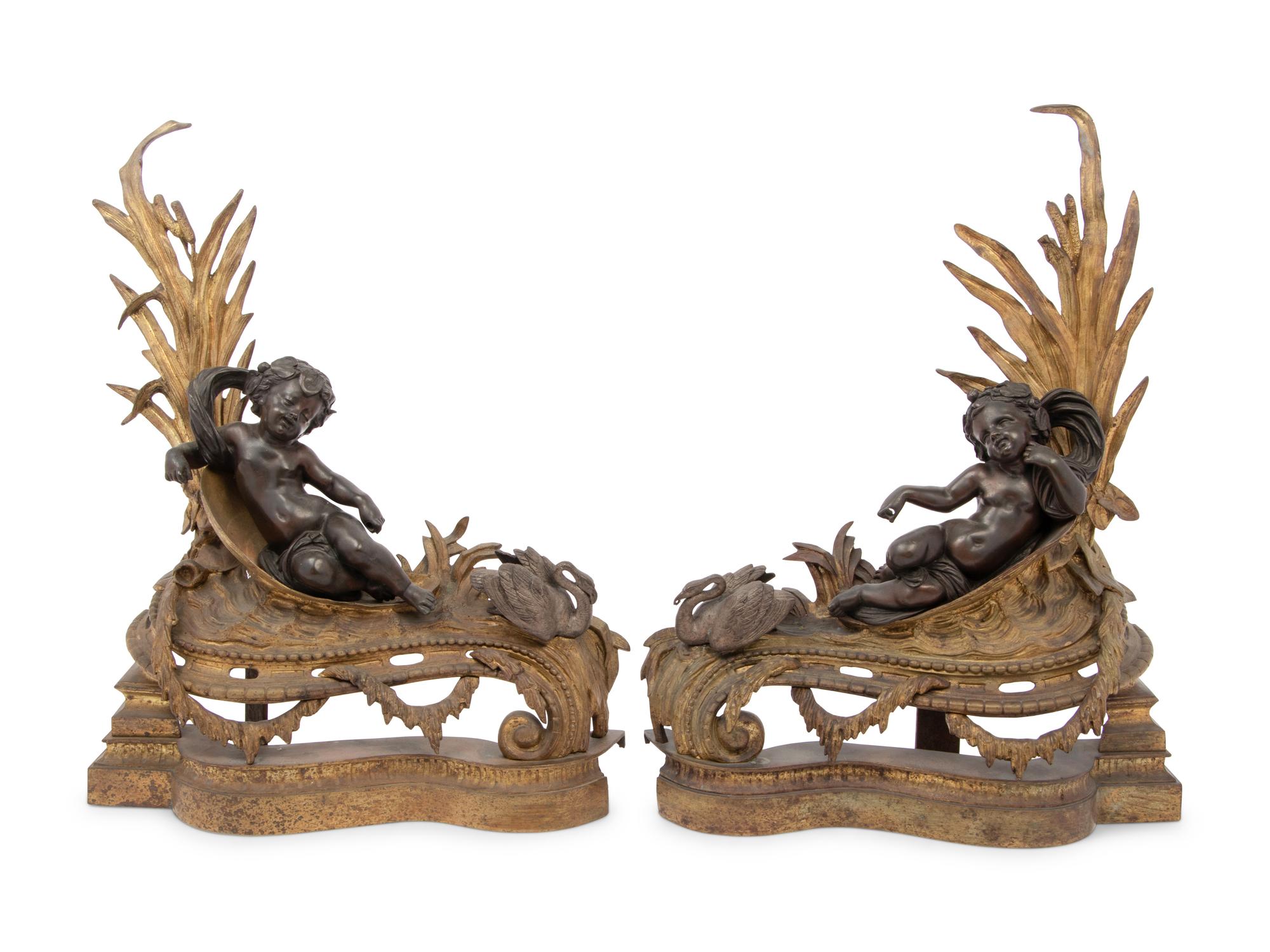 A Pair of Louis XV Style Gilt and Patinated Bronze Figural Chenets