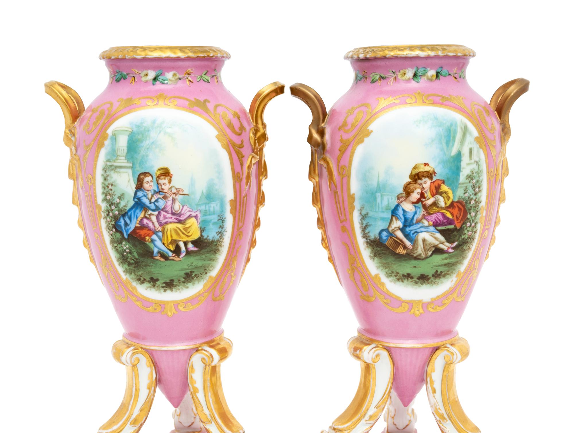 A Pair of Continental Porcelain Tripod Vases
