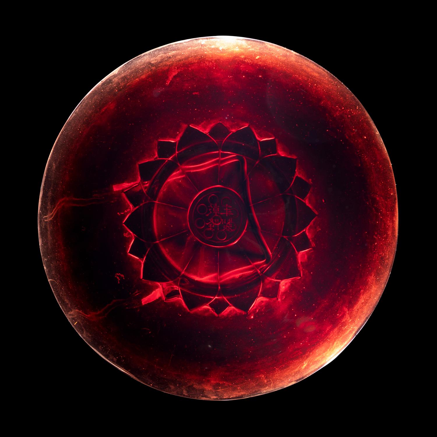 A Chinese Carved Ruby Red 'Lotus' Peking Glass Plate, Late 19th-Early 20th Century 晚清-民國 寶石紅料蓮紋賞盤