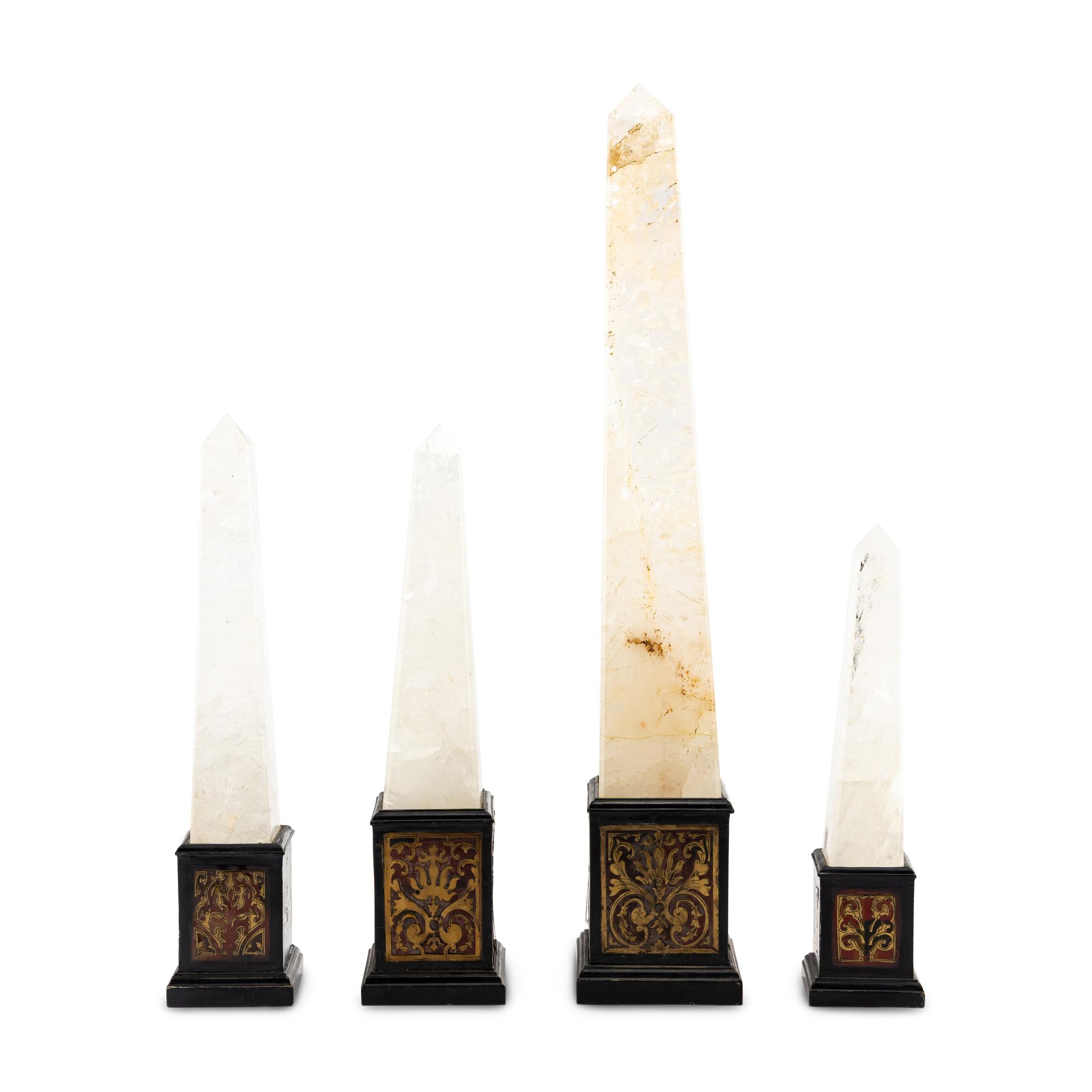 A Set of Four Graduated Rock Crystal Obelisks with Boulle Marquetry Bases