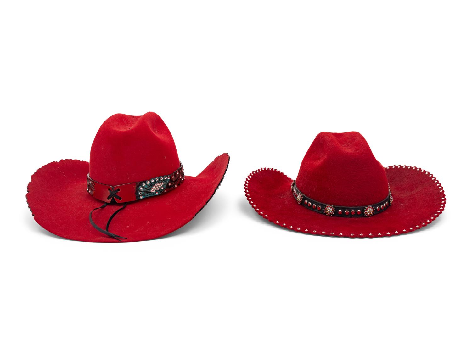 Two Red Western Hats and Hat Case