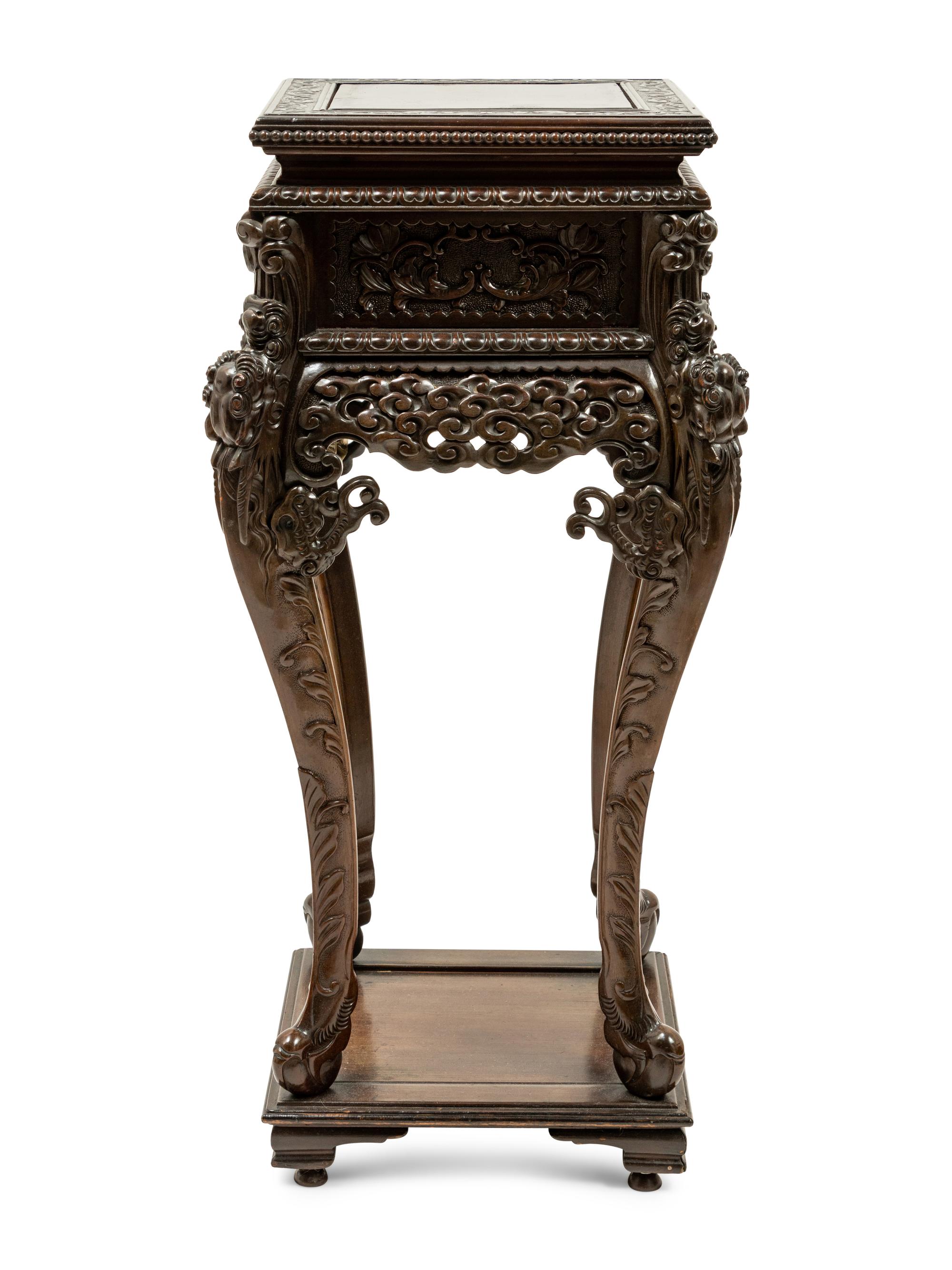 A Chinese Carved Hardwood Stand