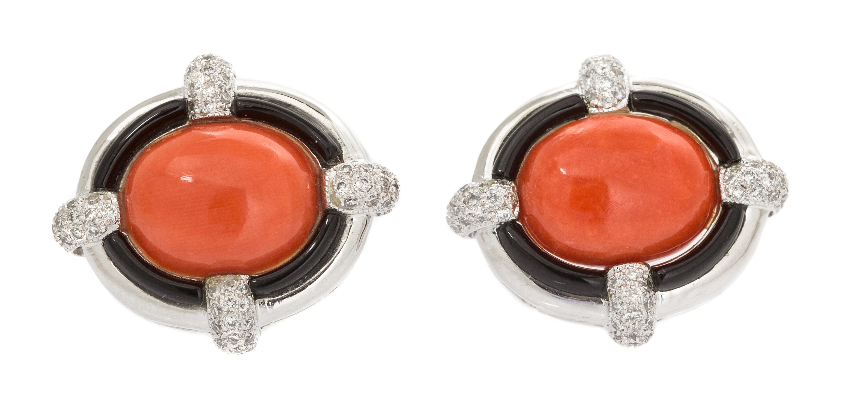 A Pair of 18 Karat White Gold, Coral, Onyx and Diamond Cufflinks, Eli Frei, 9.00 dwts.
