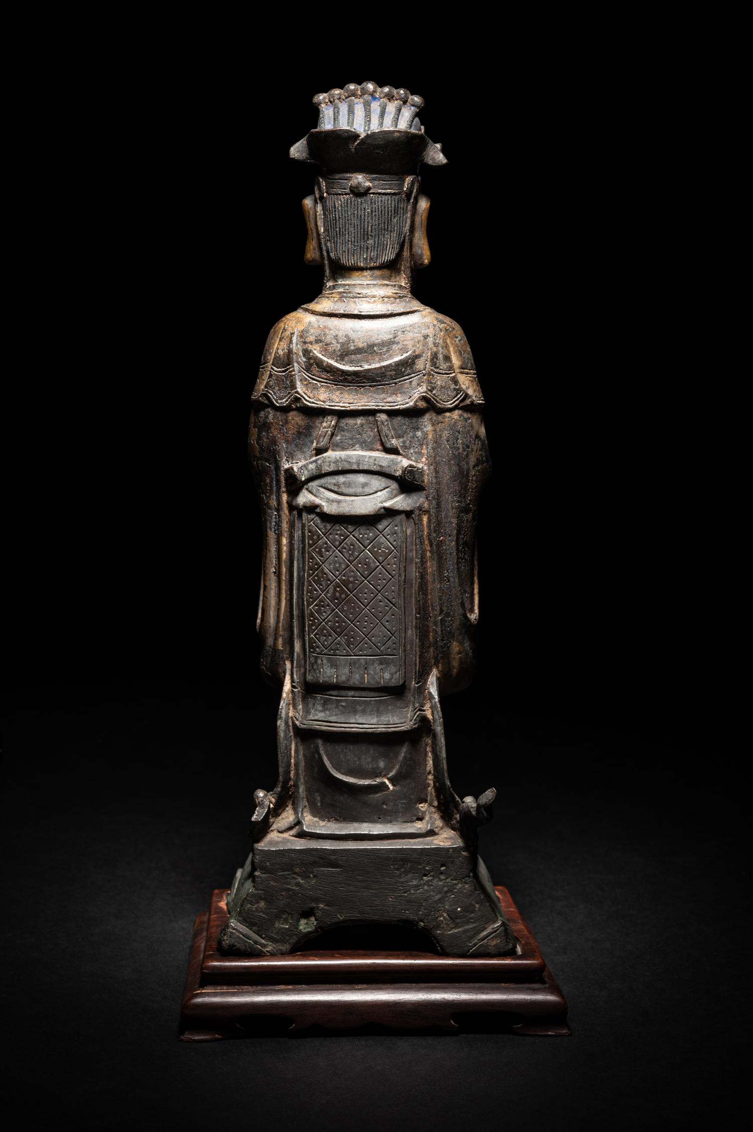 A Pair of Chinese Gilt Decorated Bronze Figures of Standing Officials