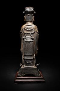 A Pair of Chinese Gilt Decorated Bronze Figures of Standing Officials