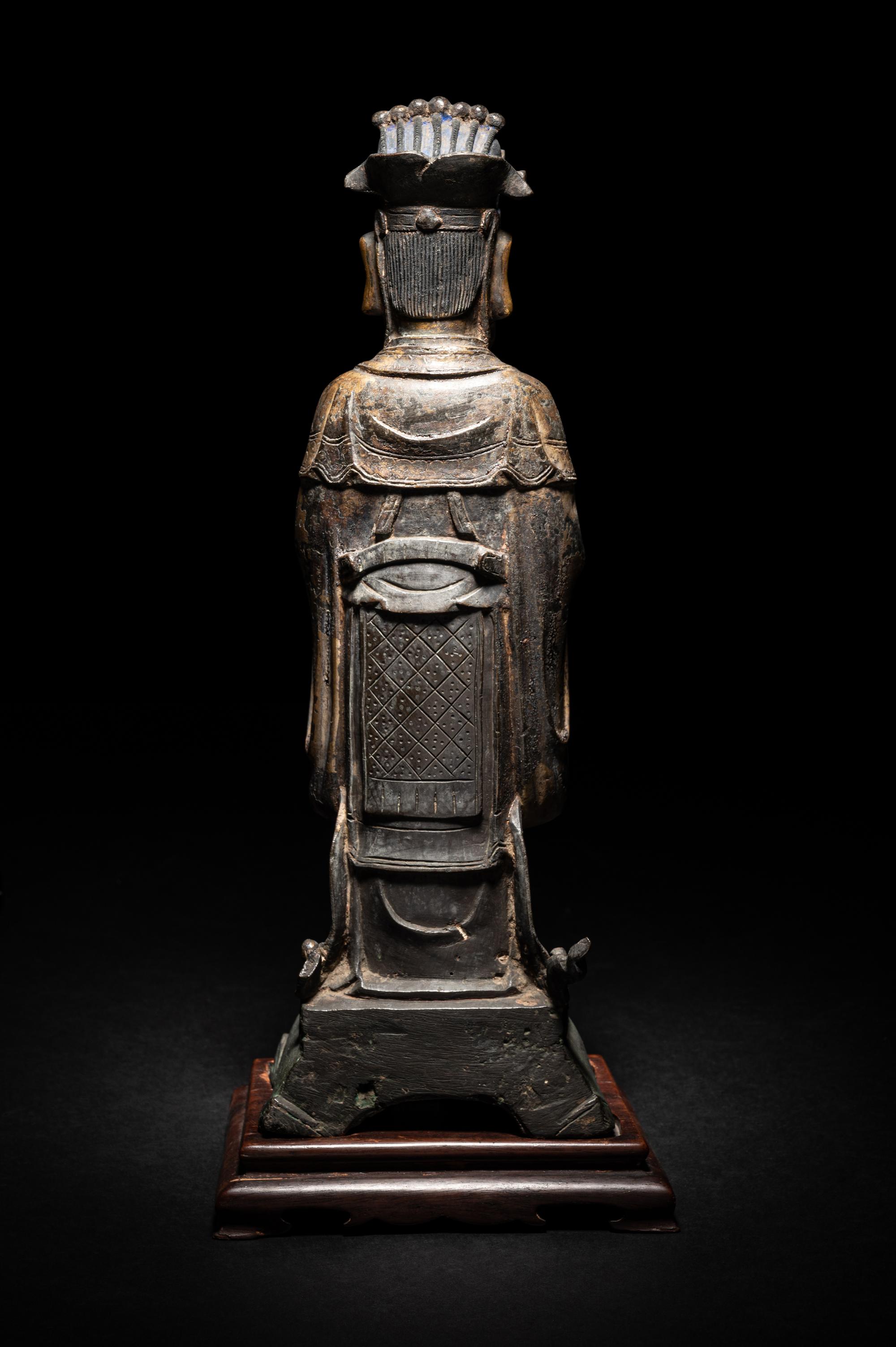 A Pair of Chinese Gilt Decorated Bronze Figures of Standing Officials