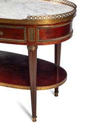 A Louis XVI Style Gilt Bronze Mounted Mahogany Marble-Top Console Desserte