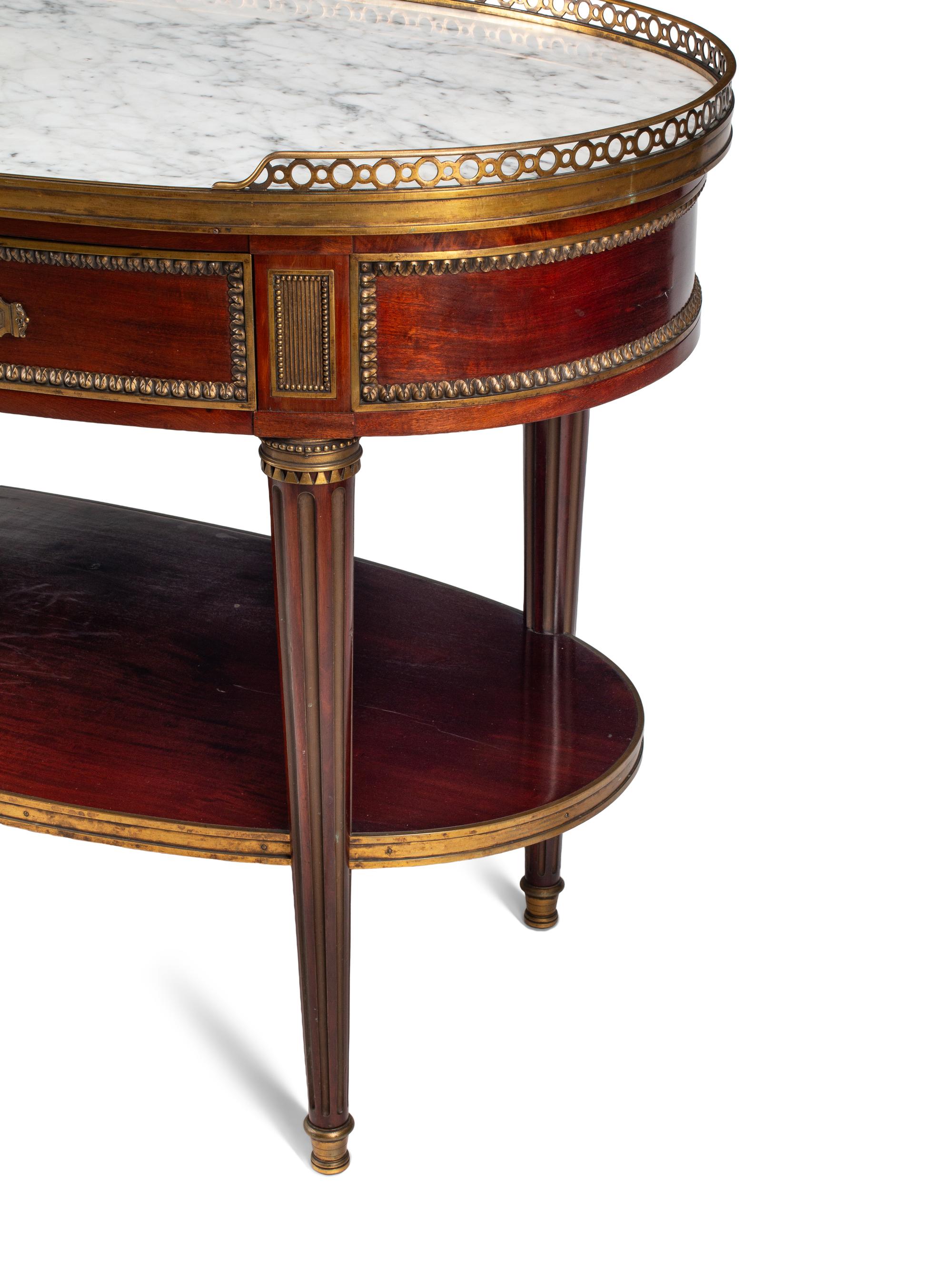 A Louis XVI Style Gilt Bronze Mounted Mahogany Marble-Top Console Desserte