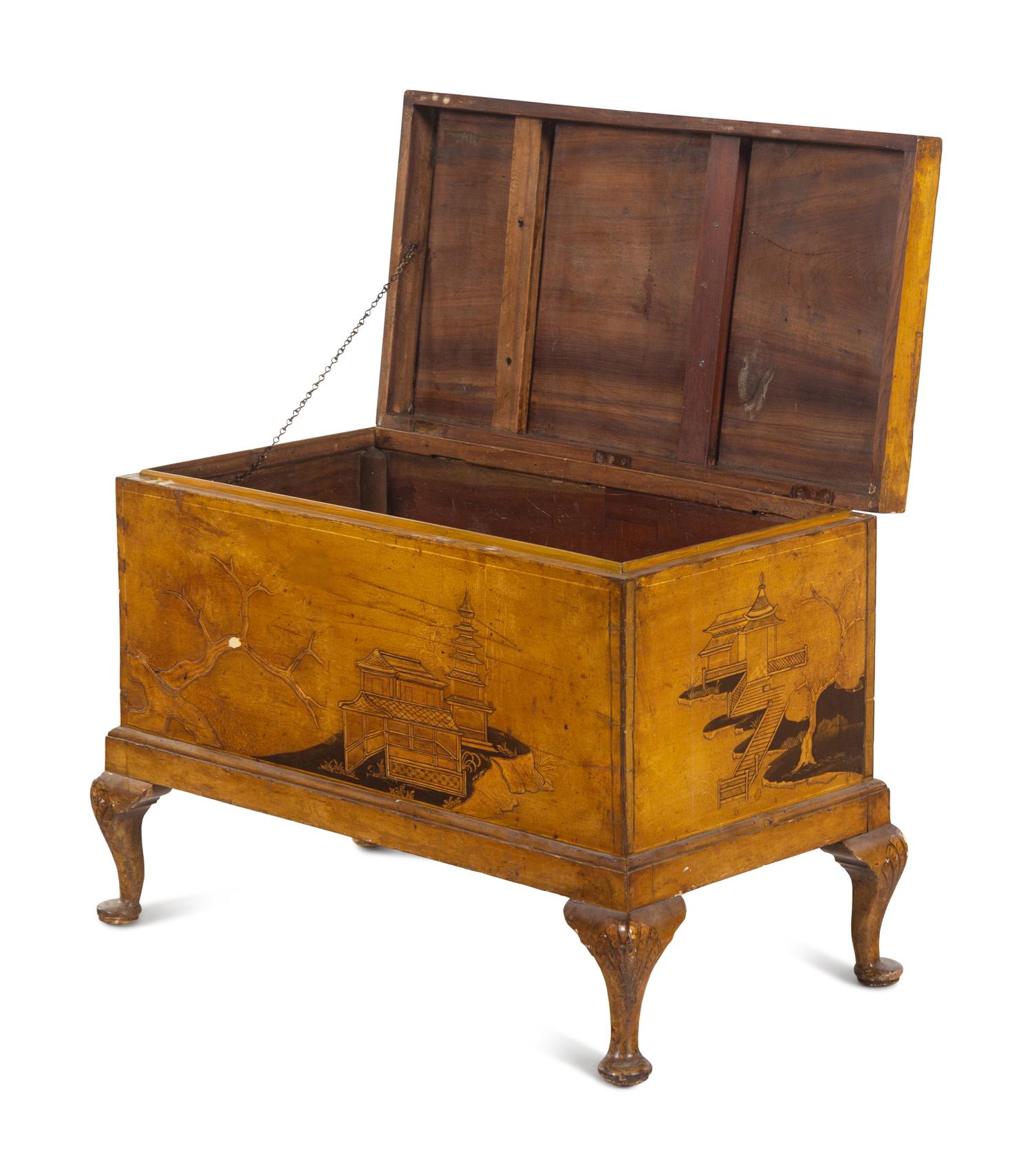 A Chinoiserie Decorated Trunk on Stand