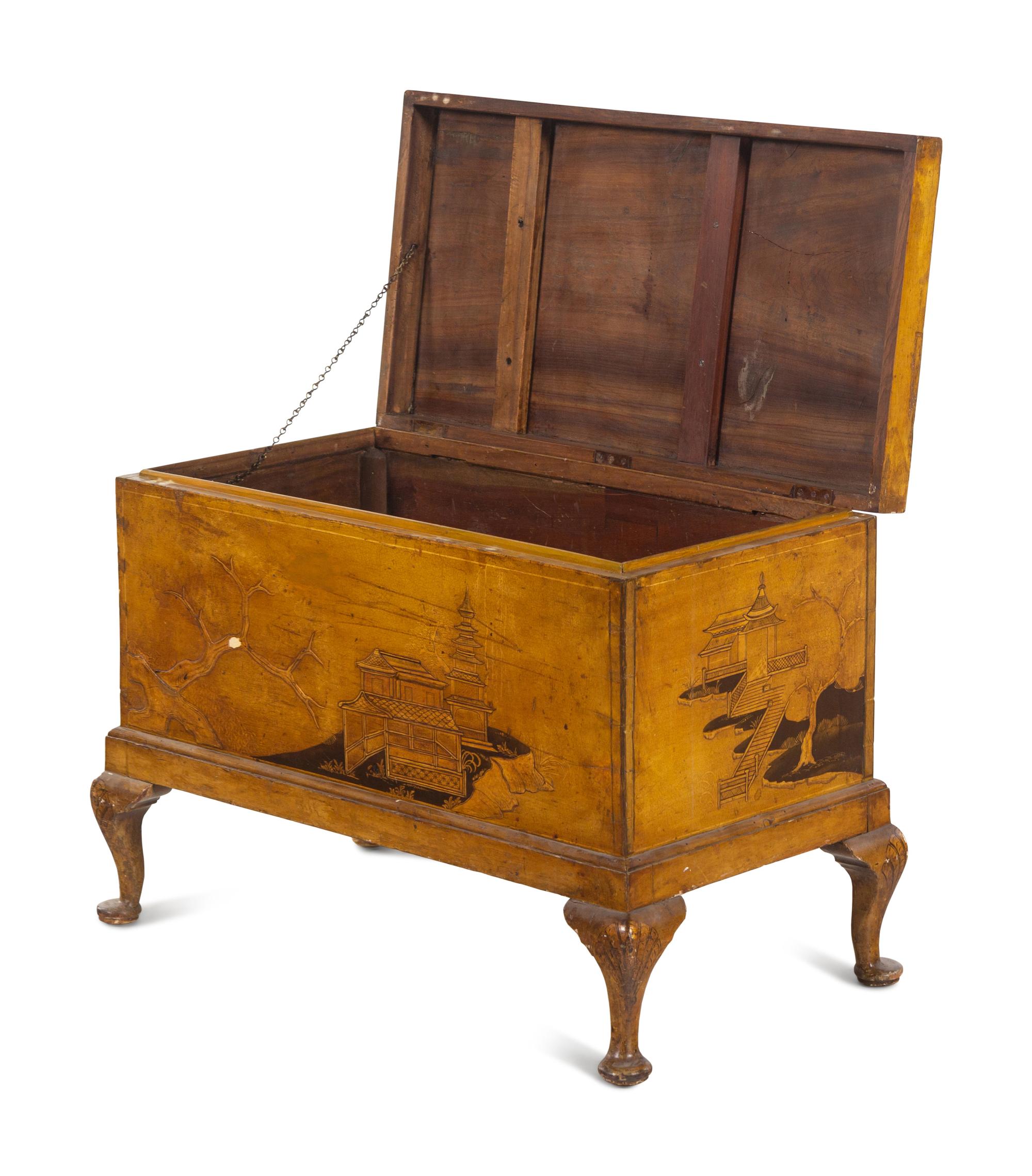 A Chinoiserie Decorated Trunk on Stand