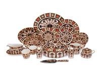 A Royal Crown Derby Imari Porcelain Dinner Service