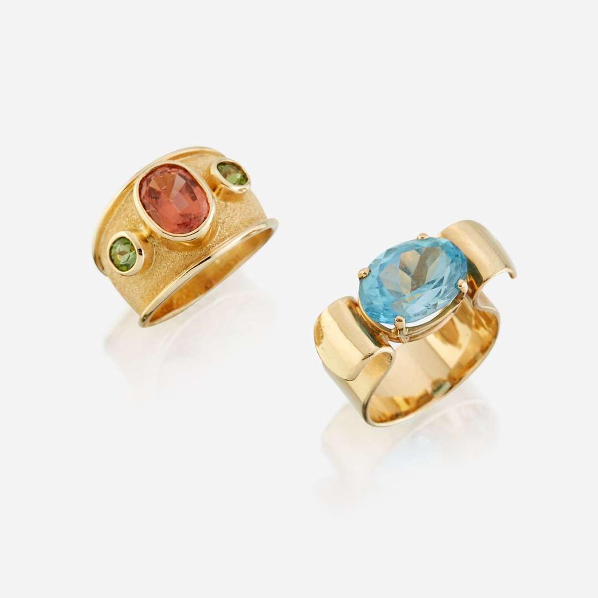 Two fourteen karat gold and gem-set rings