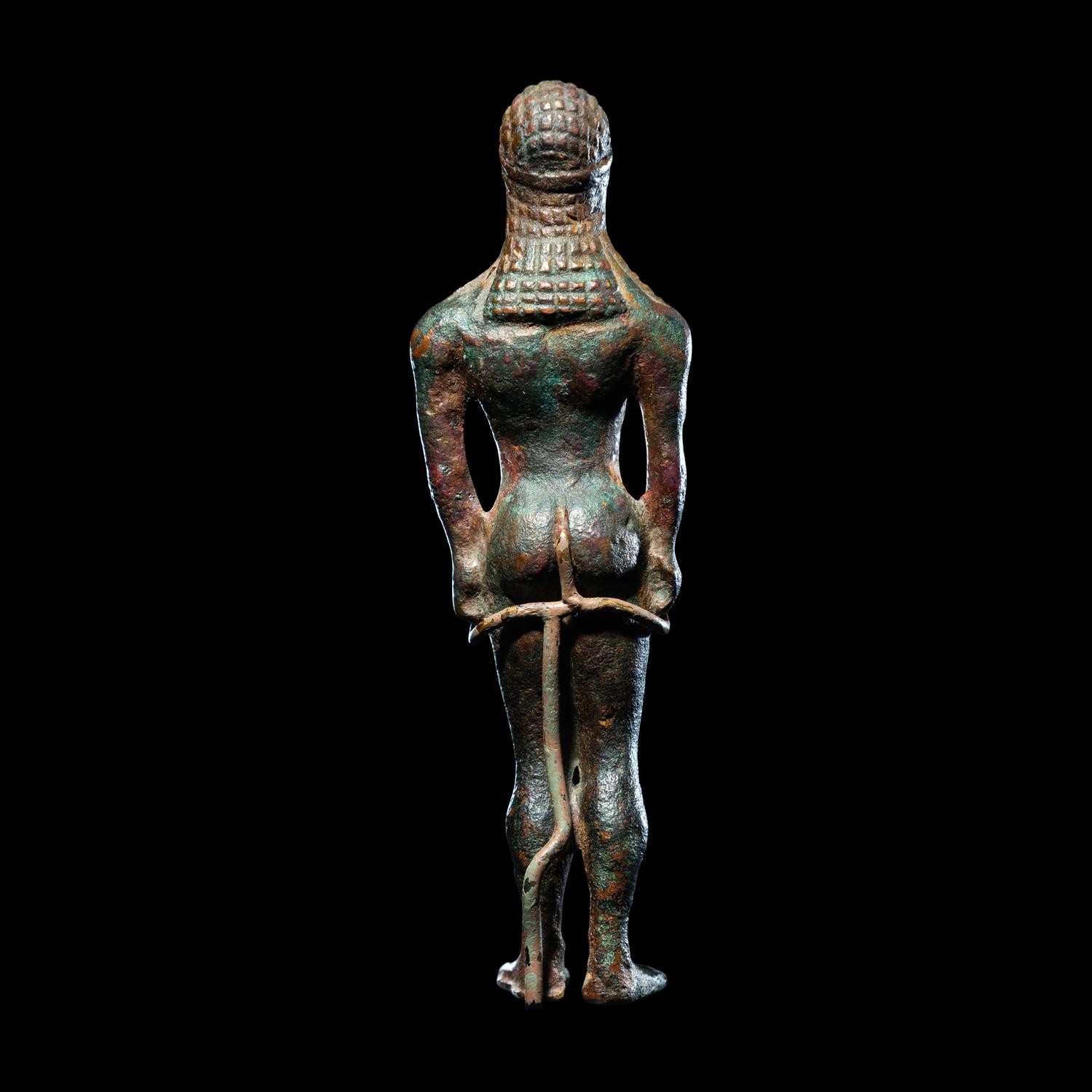 A Greek Bronze Kouros