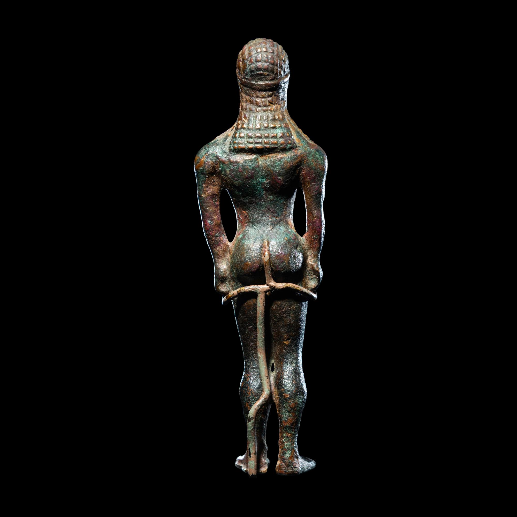 A Greek Bronze Kouros