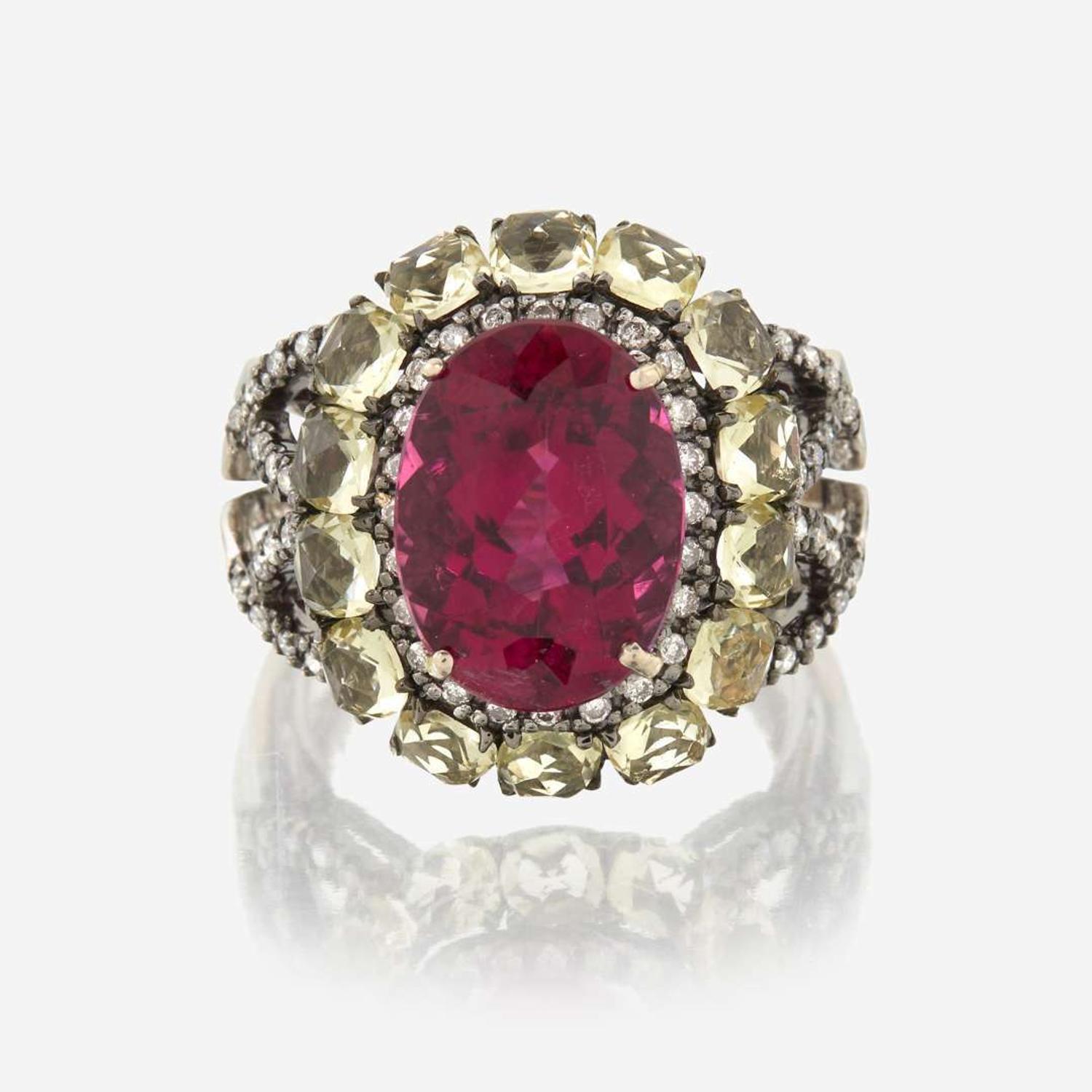 A pink tourmaline, peridot, diamond, and eighteen karat gold ring