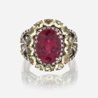 A pink tourmaline, peridot, diamond, and eighteen karat gold ring