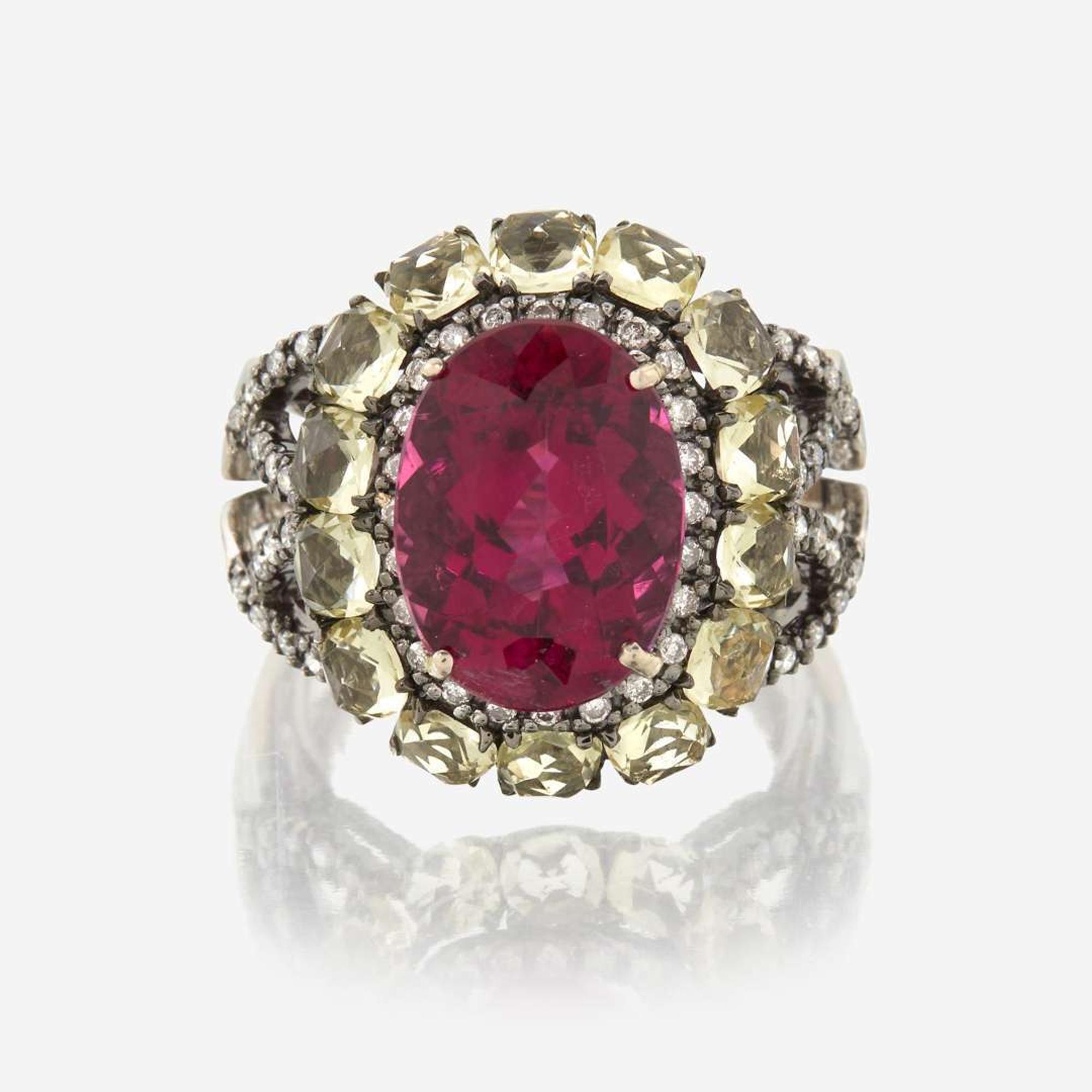 A pink tourmaline, peridot, diamond, and eighteen karat gold ring