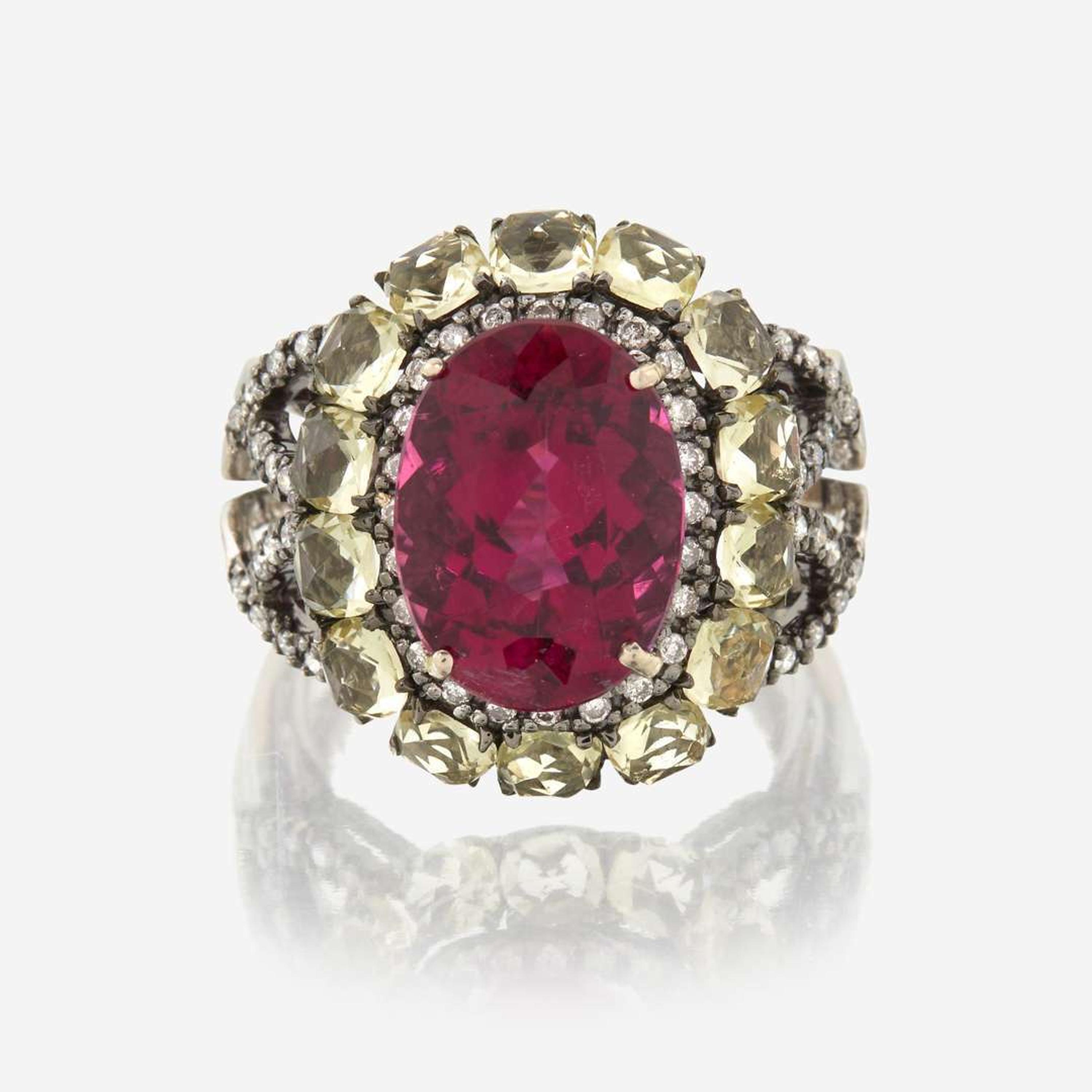 A pink tourmaline, peridot, diamond, and eighteen karat gold ring