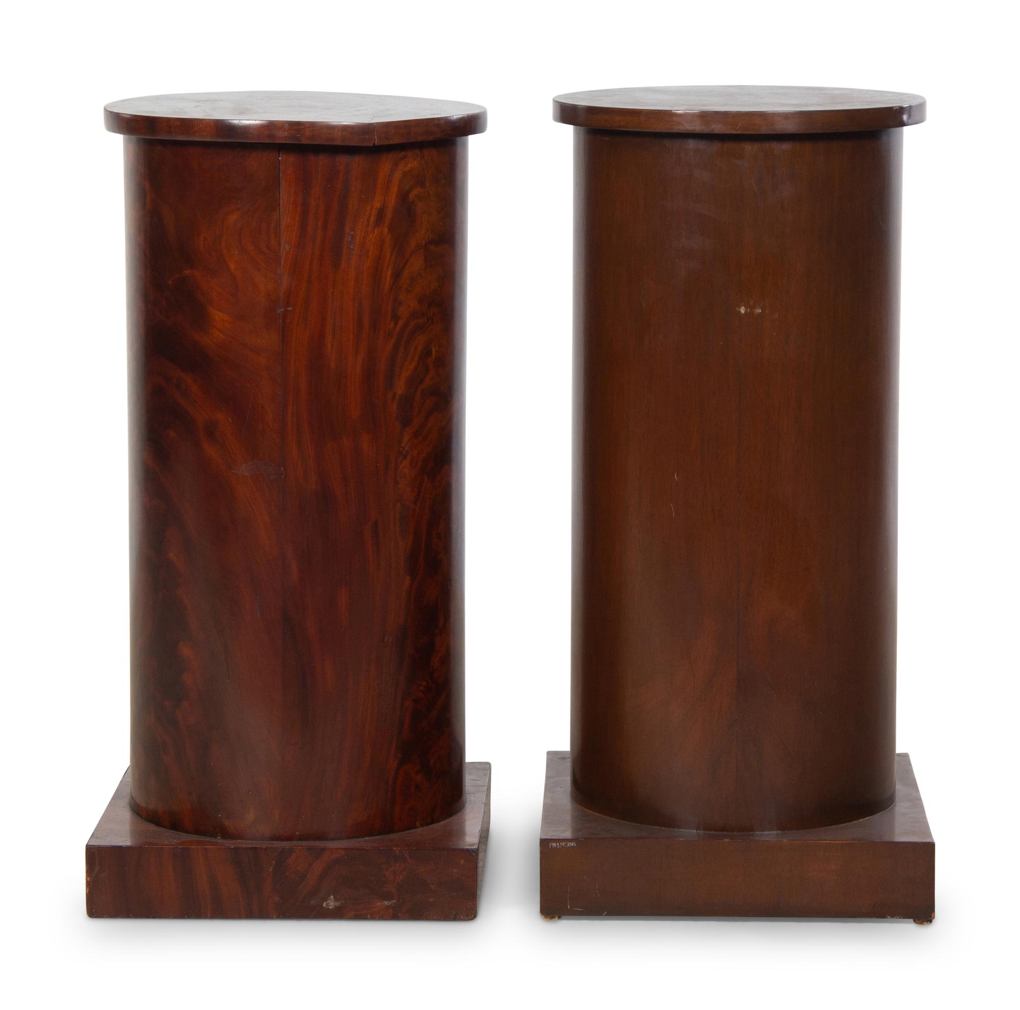 A Matched Pair of Mahogany Veneered Pedestals