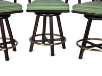 A Set of Three Stained Wood, Leather and Brass Bar Stools — 20TH CENTURY