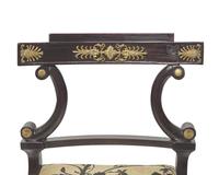 A set of eight Neoclassical gilt-bronze mounted ebonized dining chairs, possibly Baltic Region, circa 1820