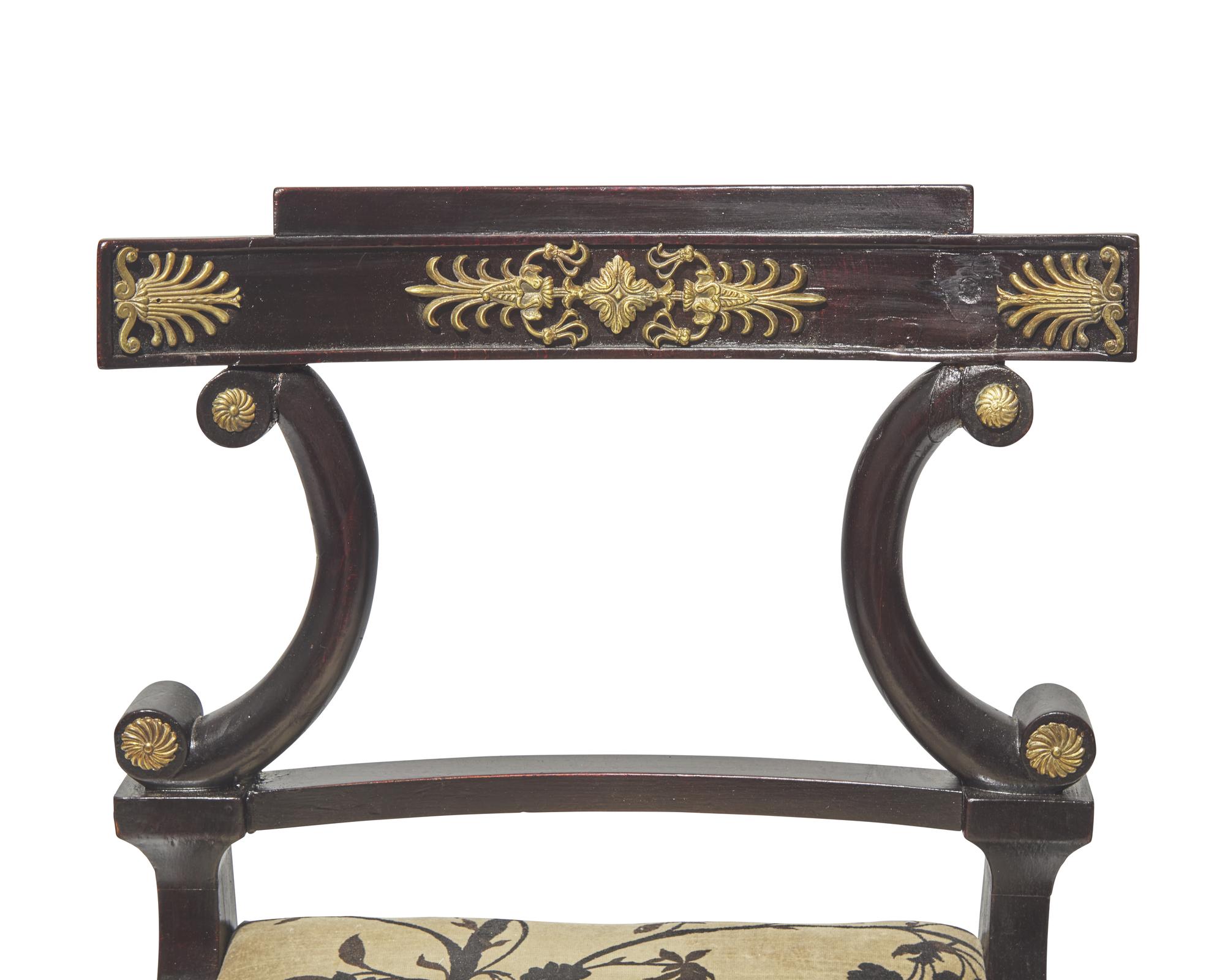 A set of eight Neoclassical gilt-bronze mounted ebonized dining chairs, possibly Baltic Region, circa 1820