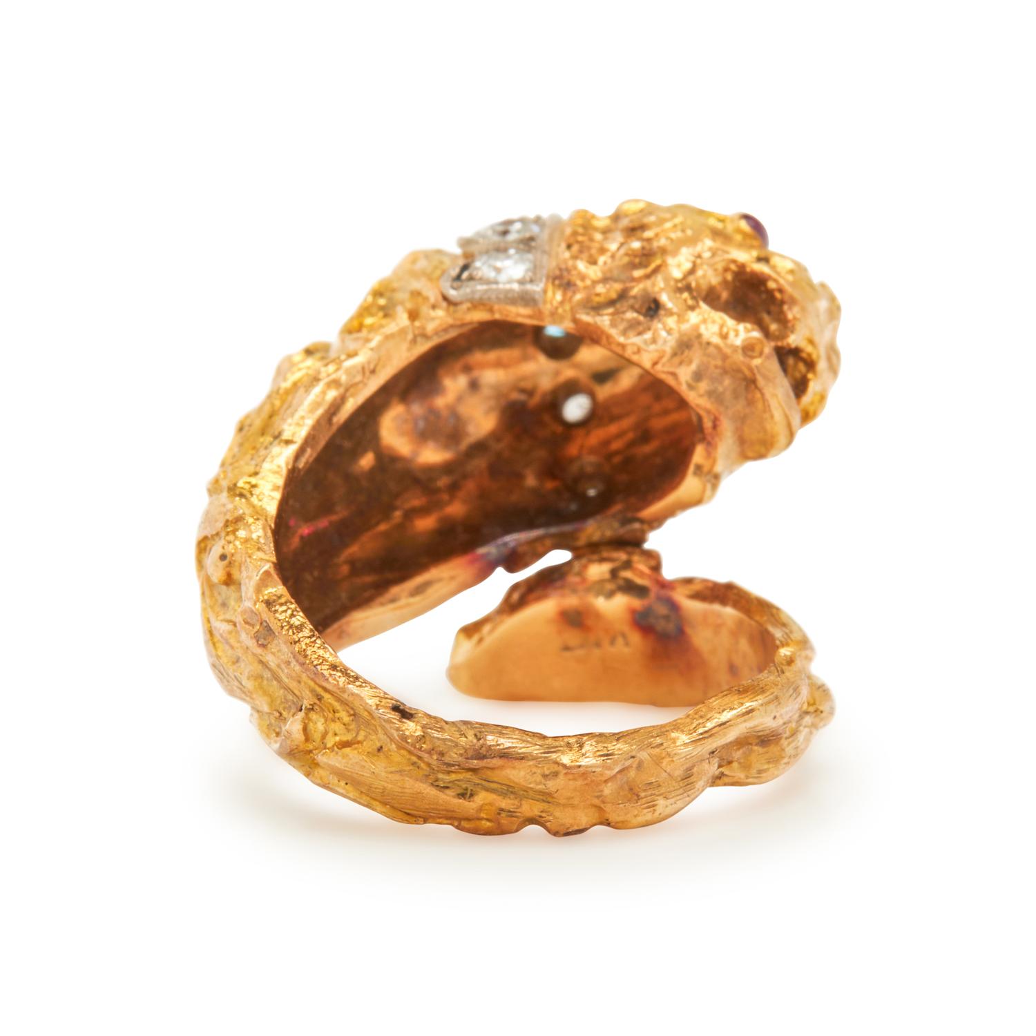 BICOLOR GOLD, DIAMOND AND RUBY LION'S HEAD RING