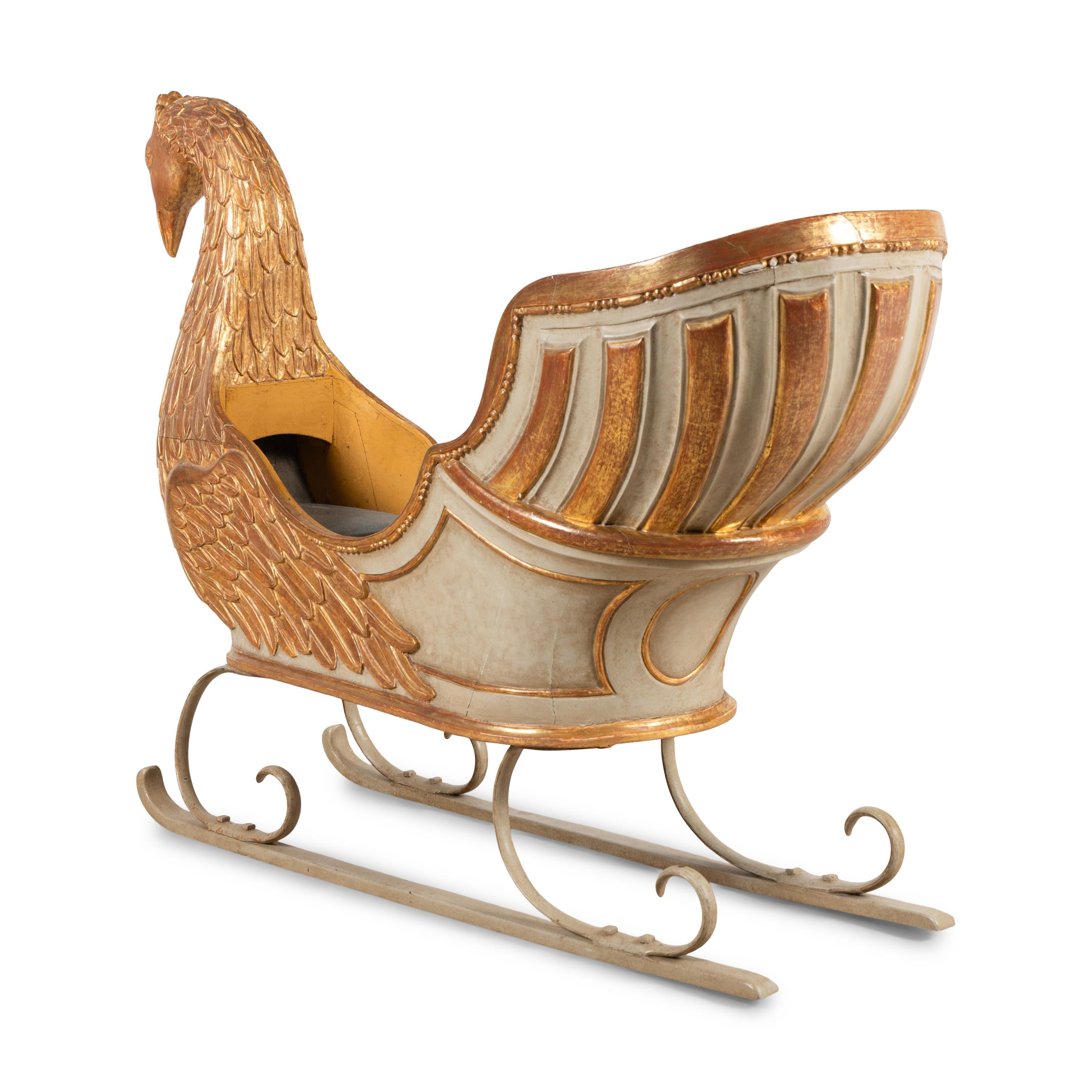 A Giltwood and Grey-Painted Carousel Sleigh
