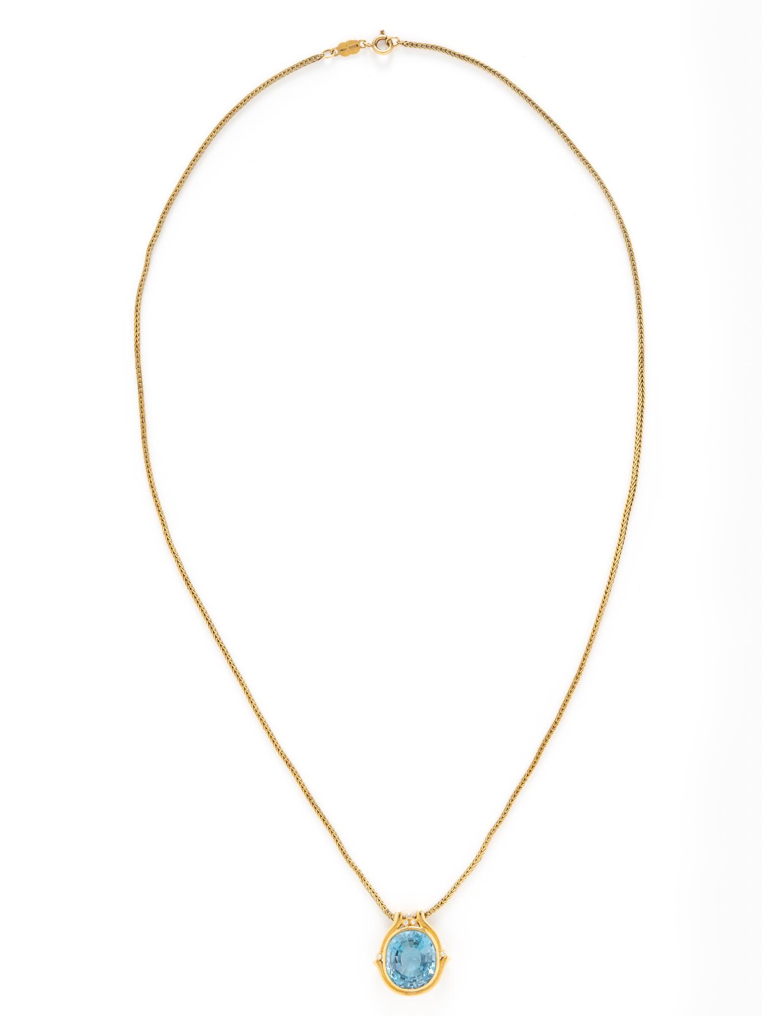 YELLOW GOLD, BLUE TOPAZ, AND DIAMOND PENDANT NECKLACE