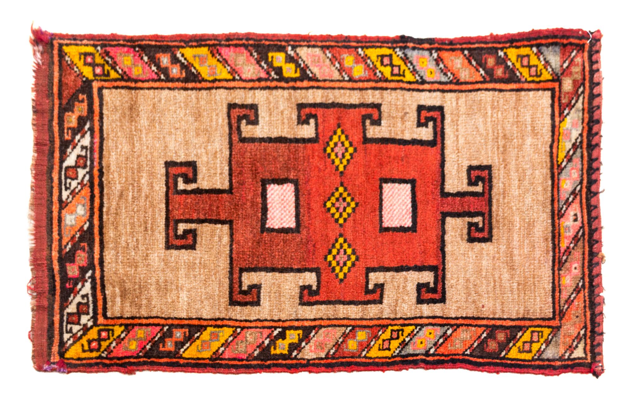 A Turkish Yastik 2 feet 11 inches x 1 foot 10 inches.