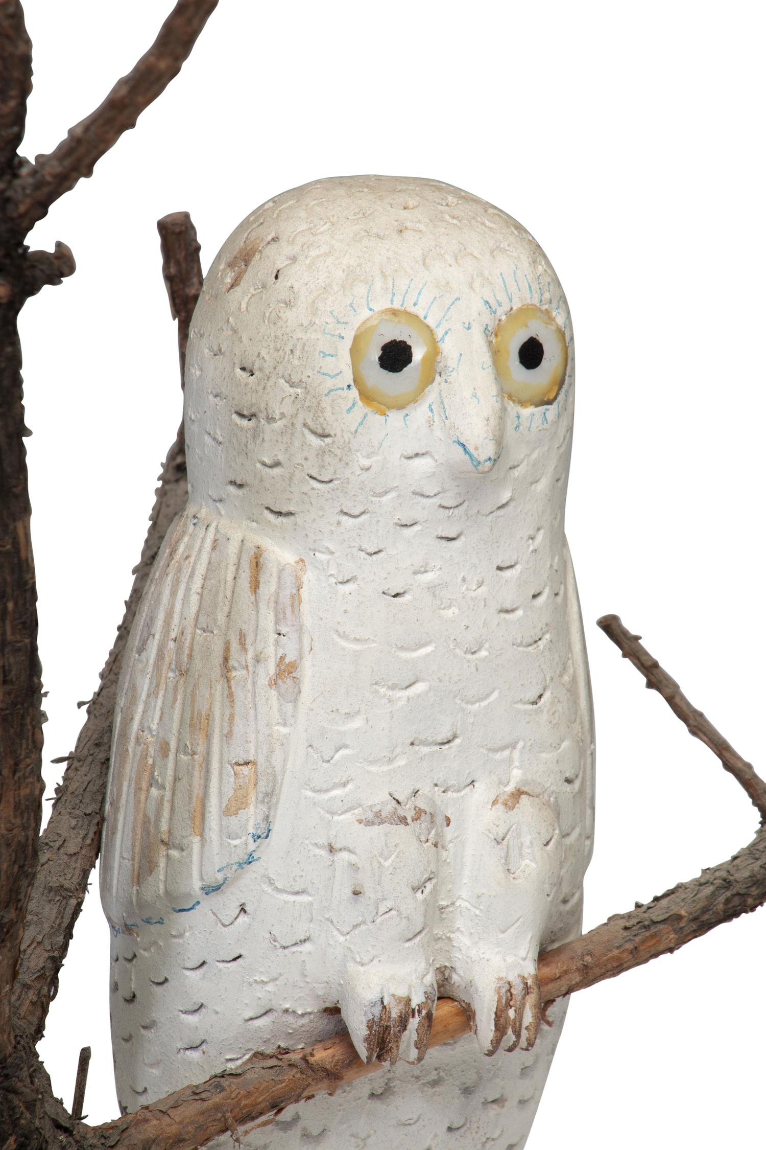 A Folk Art Carving of a Snowy Owl Perched in Tree