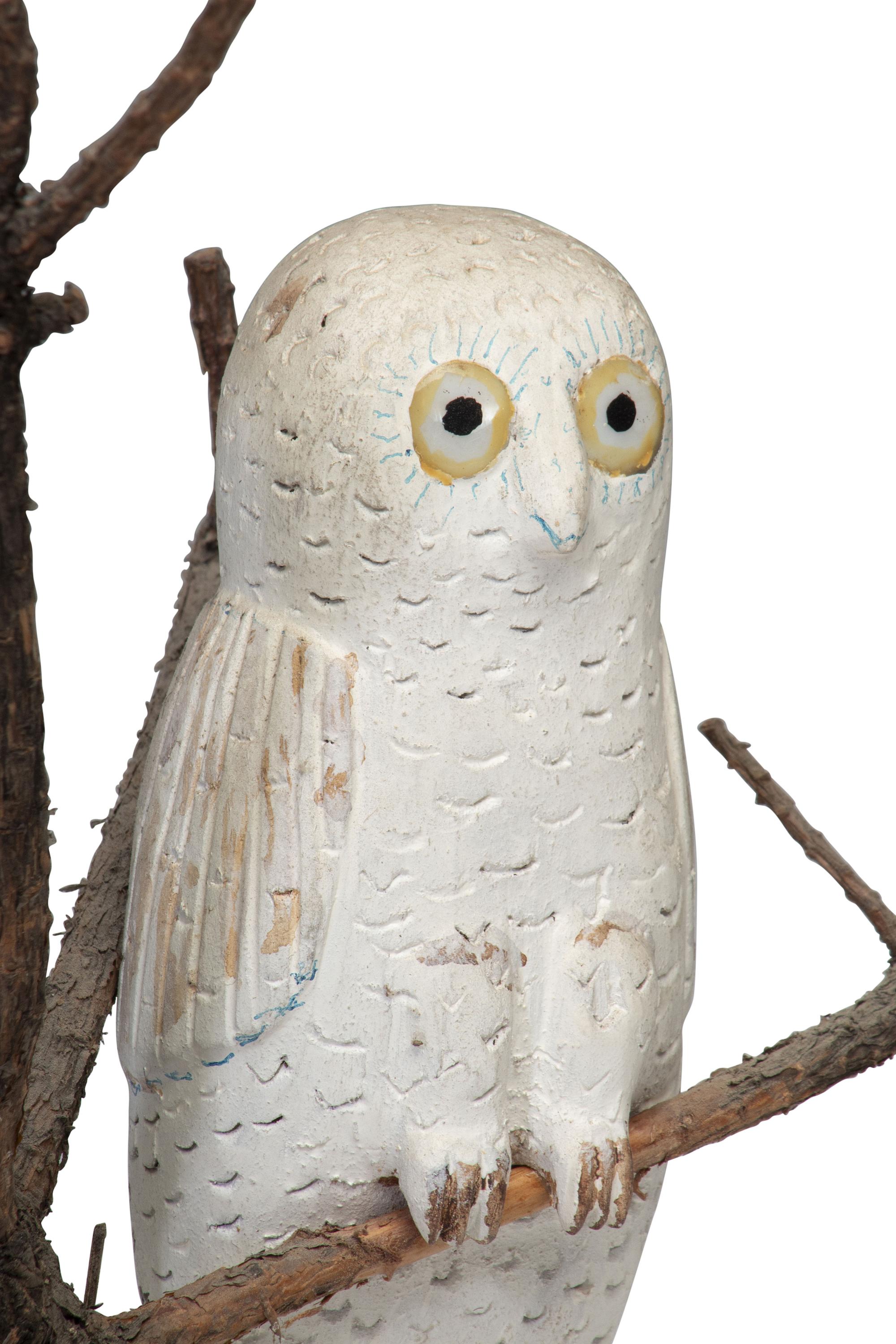 A Folk Art Carving of a Snowy Owl Perched in Tree