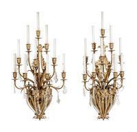 A Set of Four Gilt Bronze and Baccarat Glass Sconces
