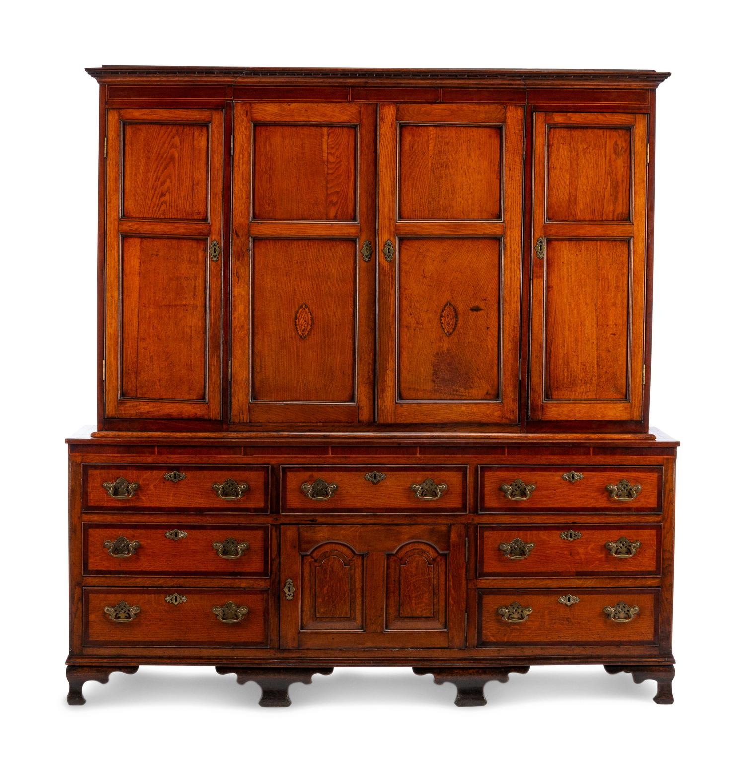 A George III Inlaid Oak Cupboard on a Later Dresser Stand