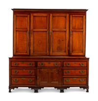 A George III Inlaid Oak Cupboard on a Later Dresser Stand